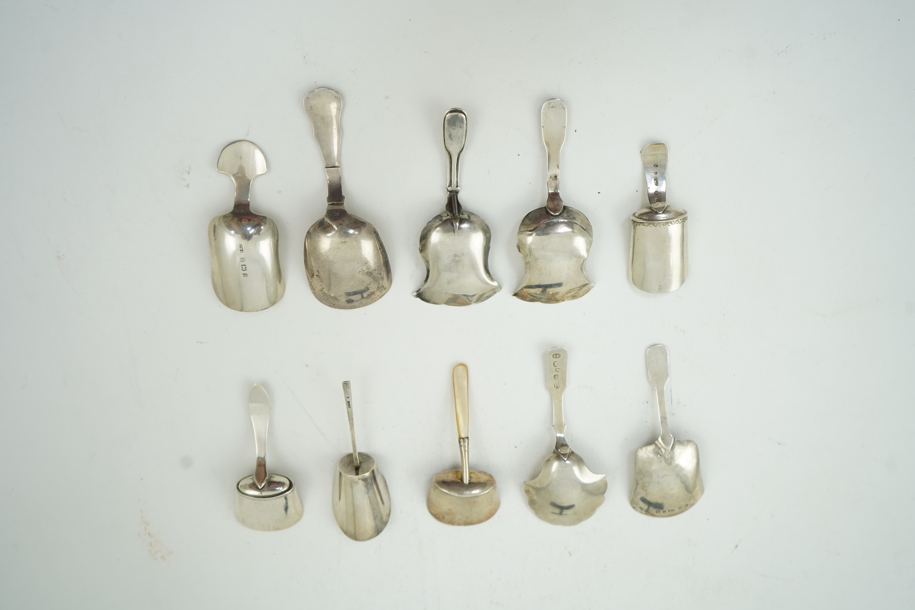 Ten assorted mainly 19th century silver caddy spoons, most with shovel bowls